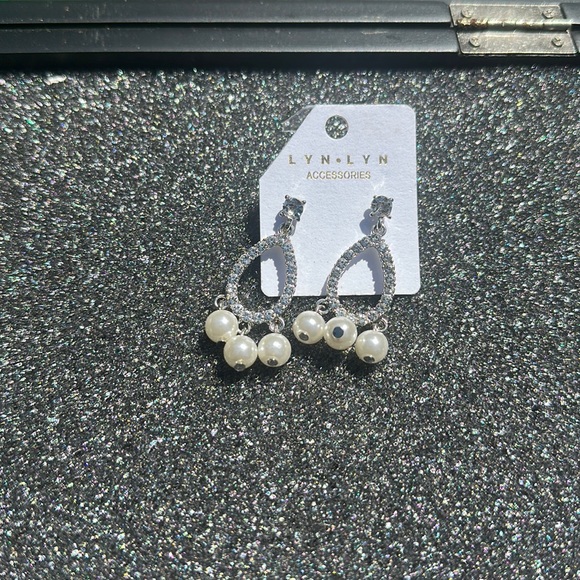 Lyn Lyn Accessories tear drop CZ lined with synthetic pearls earrings 2” - Picture 2 of 3